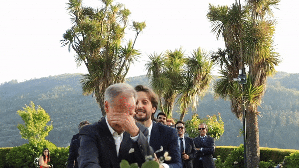 emotional groom during aisle walk