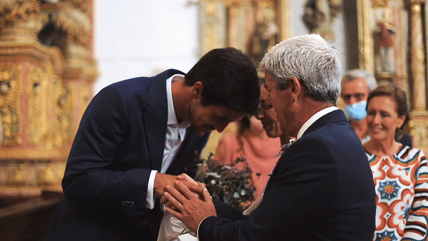 emotional groom during aisle walk