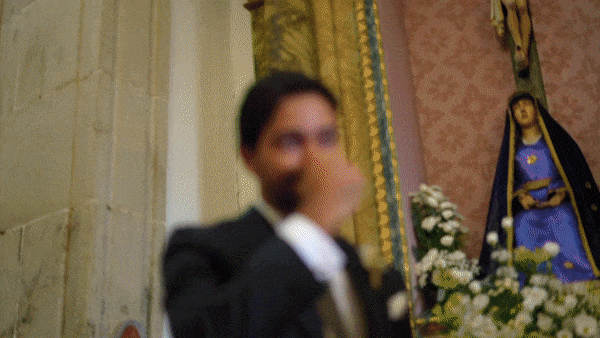 emotional groom during aisle walk